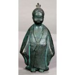 Japanese bronze figure of a boy, having a smiling face and top knotted hair, in a kimono, approx.