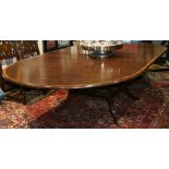 English George III style mahogany dining table, having a circular top with inlaid banding, two 24"