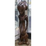 Hemba style D.R. Congo figural statue, 37"h, unproven age and authenticity. Provenance: Estate of