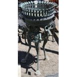 Renaissance style patinated bronze jardiniere, having a reticulated planter surmounting the