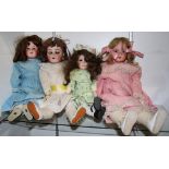 (lot of 4) Porcelain bisque head doll group, including (2) Armand Marseille and one Simon &