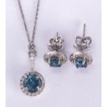 Treated blue diamond and white gold jewelry suite