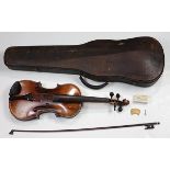 Student violin, after Joseph Guarnerius, together with a bow and case, 30.5"l overall