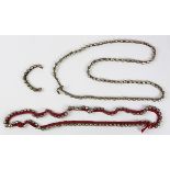 Silver and cotton link necklaces comprised of one 32 inch, red woven cotton cord, featuring (92)