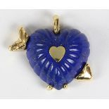 Carved lapis lazuli and 14k yellow gold heart pendant featuring (1) carved lapis lazuli heart,