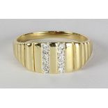 Diamond and 10k yellow gold ring featuring (10) full-cut diamonds, weighing a total of approximately