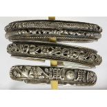 (Lot of 3) Chinese silver bracelets comprised of two 13.0 mm wide silver open bangle bracelets,
