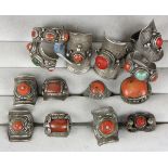 (Lot of 14) Chinese multi-stone, resin, silver and metal rings comprised of six coral and silver