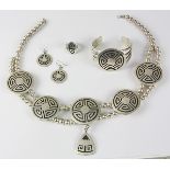 Native American sterling silver jewelry suite comprised of one sterling silver labyrinth motif