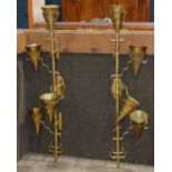 (lot of 2) Hollywood Regency style brass sconces, each having five lights with cone shades, having