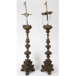 Pair of 19th century patinated metal candle prickets mounted as lamps, having a baluster standard