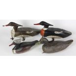 (lot of 4) Duck decoy group, consisting of (4) variously decorated duck decoys, largest 8"h x 17.5"w