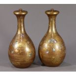 (lot of 2) Japanese of gilt lacquered bottles with lids, 18th/19th century, on the slender neck