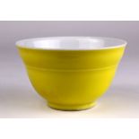 Chinese yellow glazed porcelain cup, the recessed base with an apocryphal Qianlong, 4.5"h