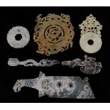 (lot of 6) Chinese archaistic hardstone items, consisting of three bi-disc, an ax, a blade with