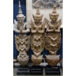 (lot of 3) Thai wood Buddhist figures, each in elaborate attire with hands clasped together in front