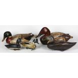 (lot of 5) Duck decoy group, consisting of (5) polychrome and carved duck decoys, (2) with "Thomas