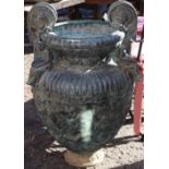 Neoclassical style cast bronze jardiniere, having an urn form, with scrolled handles, the tapered