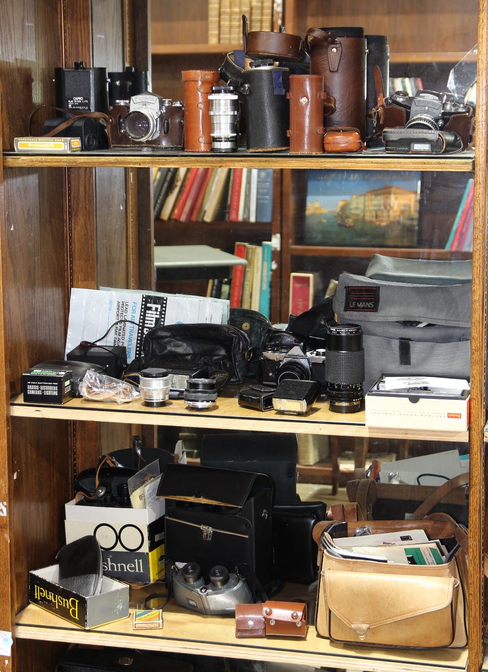 (lot of 30+) Camera and binocular group, consisting of (2) German Exakta cameras, an Olympus camera,