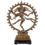 Indian bronze Nataraja (dancing lord), featuring Shiva with various attributes framed by a flaming