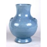 Chinese blue monochrome porcelain vase, the globular body flanked by zoomorphic handles with mock