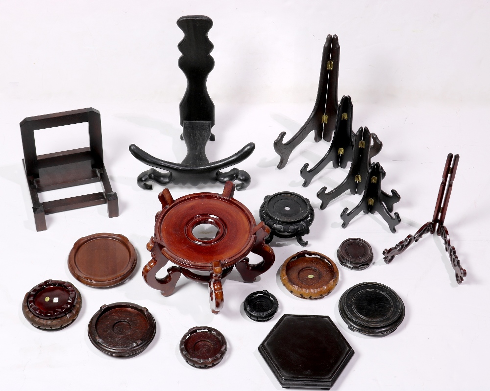 Box of Chinese wood stands, of various sizes and style, including plate stands and bases, largest: