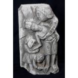 Religious stone figural fragment, depicting Christ in anguish being held by another male figure with