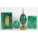 (lot of 4) Malachite desk accessories, including an egg form paperweight, two boxes each with hinged