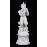 Continental blanc de chine figural group, modeled as a Satyr perched on a stylized stump playing a
