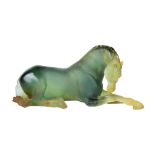 Daum pate de verre figural sculpture of a horse, executed in green, depicted in a recumbant pose,