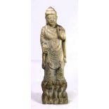 Chinese stone figural sculpture, the standing deity with left hand in abhaya mudra and holding a