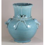 Chinese blue monochrome porcelain vase, with a gathered neck, tied with a 'cord' at the base of