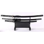 (lot of 5) Japanese two katana, one wakizashi and two katana bukuro (bags for carrying katana), in