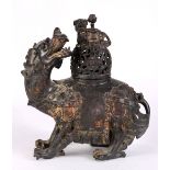 Chinese patinated bronze zoomorphic censer, with a pierced lid on the back of the mythical beast,