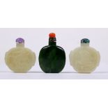 (lot of 3) Chinese hardstone snuff bottles: first two, of a pale matrix, with a double gourd, and