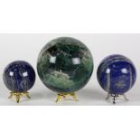 (lot of 3) Decorative stone spheres, consisting of a Flourite example, together with (2) lapis