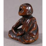 Japanese wooden netsuke, 'professional sneezer', approx. 1.5"h