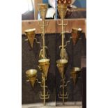 (lot of 2) Hollywood Regency style brass sconces, each having five lights with cone shades, having