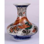 Chinese enameled porcelain vase, with a trumpet neck and a compressed body decorated with a writhing