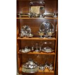 Four shelves of silver plate including George Hotel, Sheffield lidded gravy boats, English serving