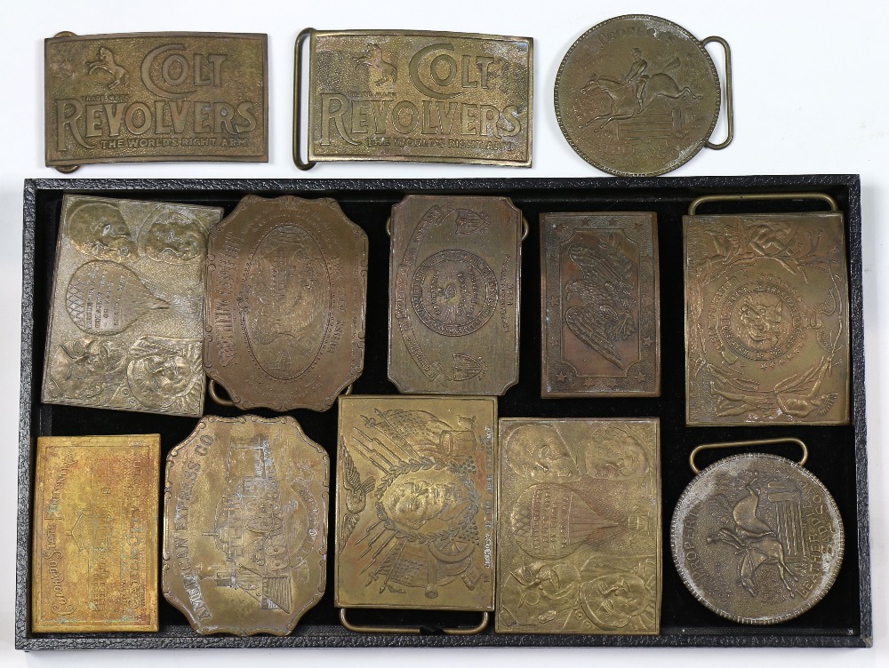 (lot of 13) Brass cast belt buckle group, including Barnum & Bailey, Leather Saddle Soap, Colt