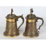 Pair of English silverplate tankards by John Grinsell & Sons, the vessels with figural panels titled