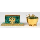(lot of 2) Russian brass and malachite desk articles, consisting of a lidded box having a snail