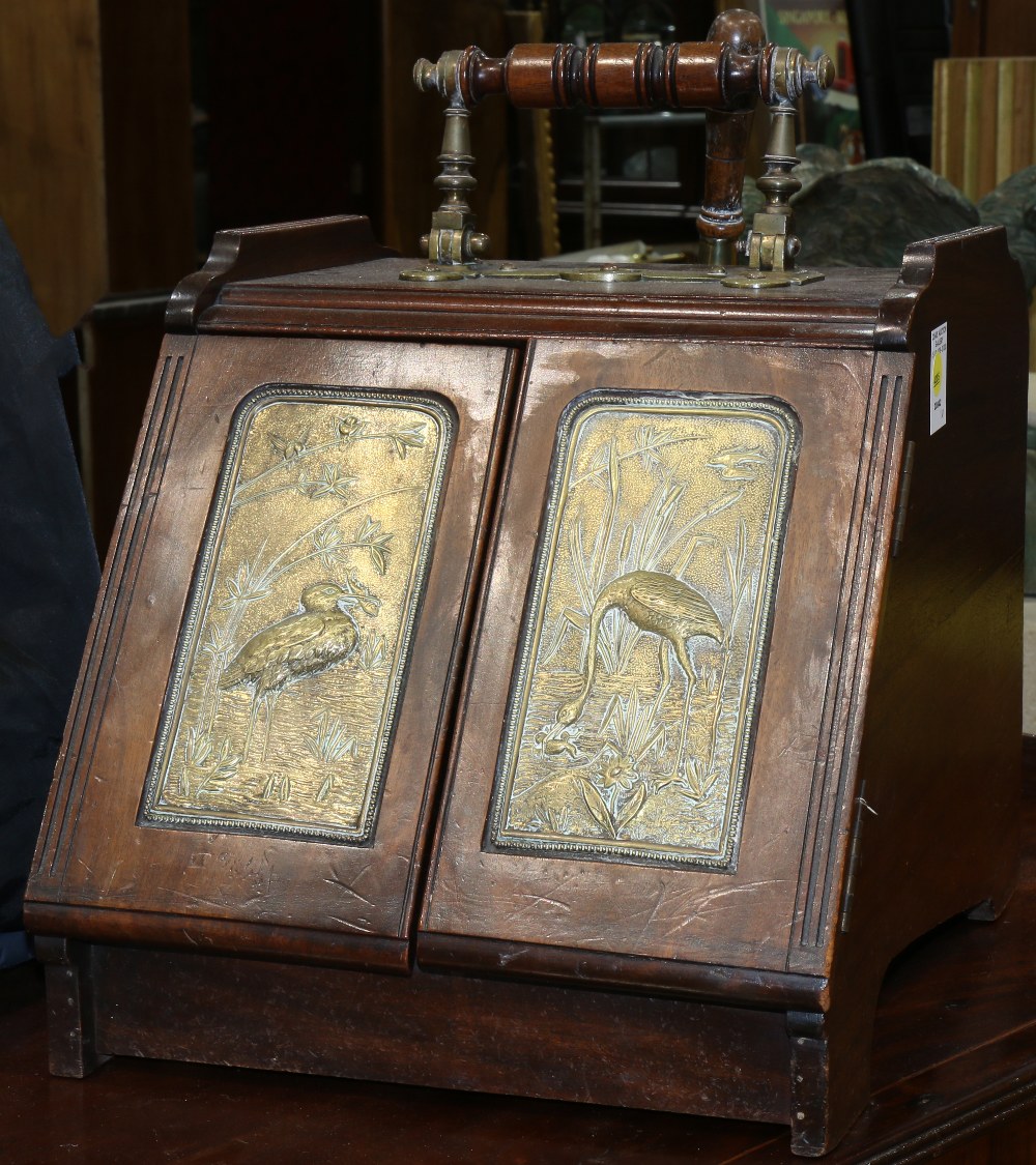 Coal scuttle, having paneled brass doors decorated with egrets, opening to a lined interior, the - Image 2 of 3