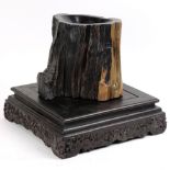 (lot of 2) Chinese wood brush pot, of tree trunk form; together with a square wood stand with wave