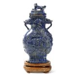 Chinese lapis lazuli covered urn, with dragon amid the cloud, with mythical beast to the finial,