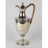 George III sterling silver jug, London 1785, Hester Bateman, having an ovoid form, with an urn