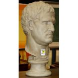 Composition male bust, executed in the Classical taste, rising on a circular base, 20.5"h