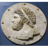 Cast stone plaque depicting a male bust, executed in the Classical taste, 33"dia.