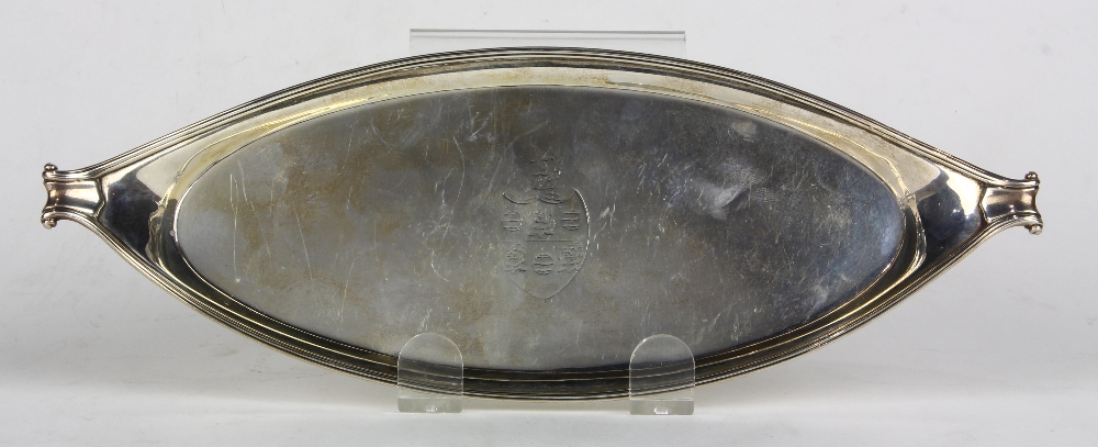 George III sterling snuffer tray 1788, London, Henry Chawner, having an oval form with scrolled end